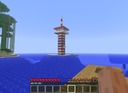 Strand-haus-mit-leucht-turm