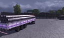 Trailer-mit-masse-rohr-holz-und-logs