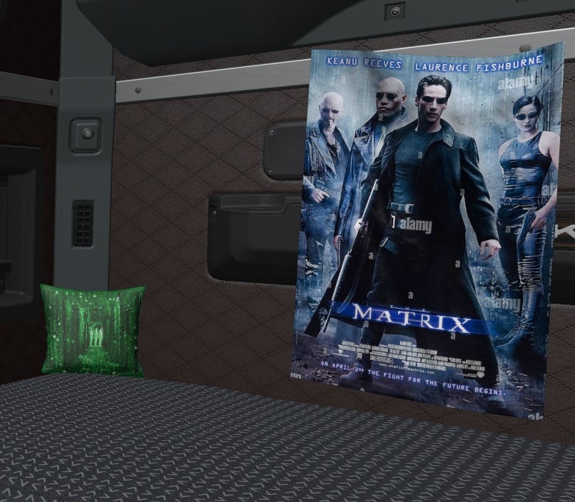 Posters, pillows and blankets in the cab of the truck  thumbnail 5