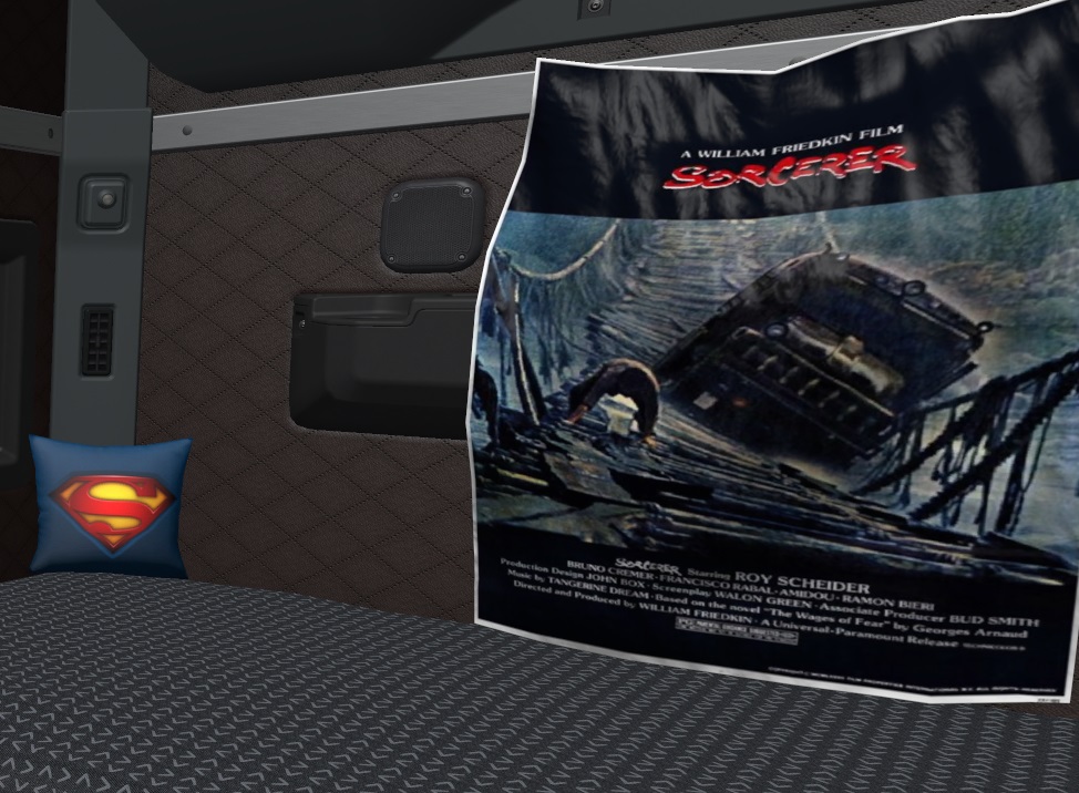 Posters, pillows and blankets in the cab of the truck  thumbnail 4