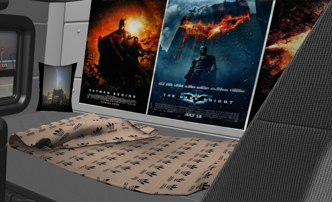 Posters, pillows and blankets in the cab of the truck  thumbnail 3
